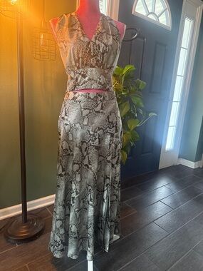 Two piece set with skirt and halter top. Skirt size 6, top size 10